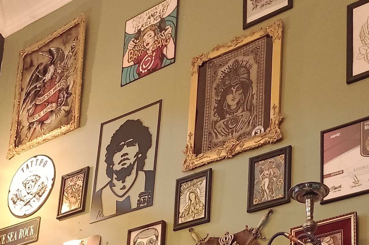 Estudio 3 Vidas — arte de tatuajes en la pared